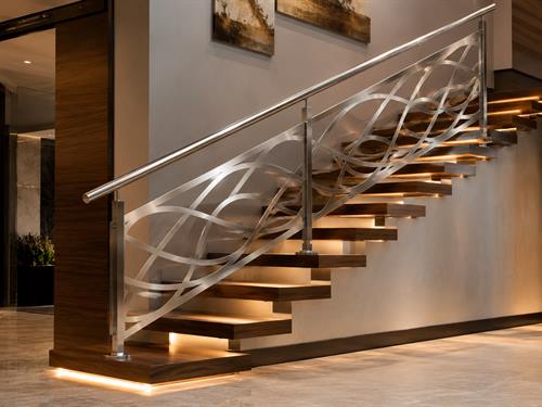 Stainless steel balustrade and handrail on an interior staircase